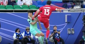 Asian Cup ace escapes red card for horror flying kick as fans say WWE star ‘would be proud’