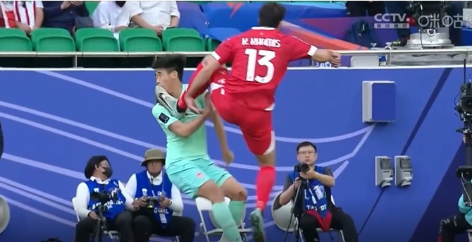 Asian Cup ace escapes red card for horror flying kick as fans say WWE star ‘would be proud’