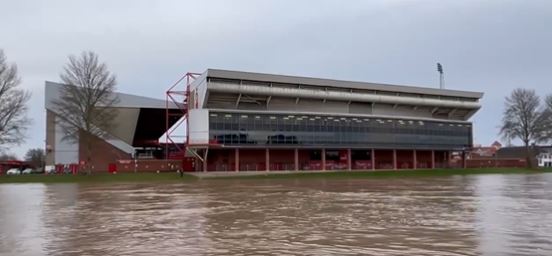 Fans fear for Premier League stadium as river threatens to spill on to pitch after Storm Henk