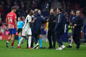 Vinicius Jr and Diego Simeone have to be separated by players and staff in heated Madrid derby