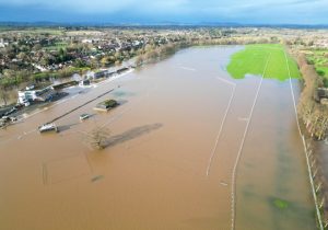 Beloved British racecourse sinks under extreme flooding as kayakers paddle down home straight