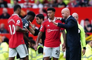 Jadon Sancho unrecognisable from Man Utd sulker as he stops to sign autographs and pose for photos with fans ‘back home’