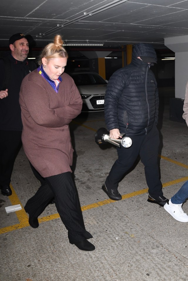 Luke Littler, 16, covers face as he and girlfriend, 21, leave Ally Pally after stunning World Darts Championship run