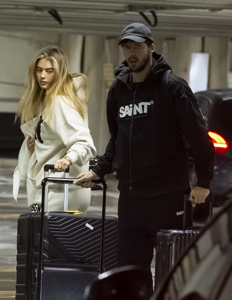 Love Island star Arabella Chi and Man City’s Dias appear to confirm romance as they’re spotted at airport before holiday