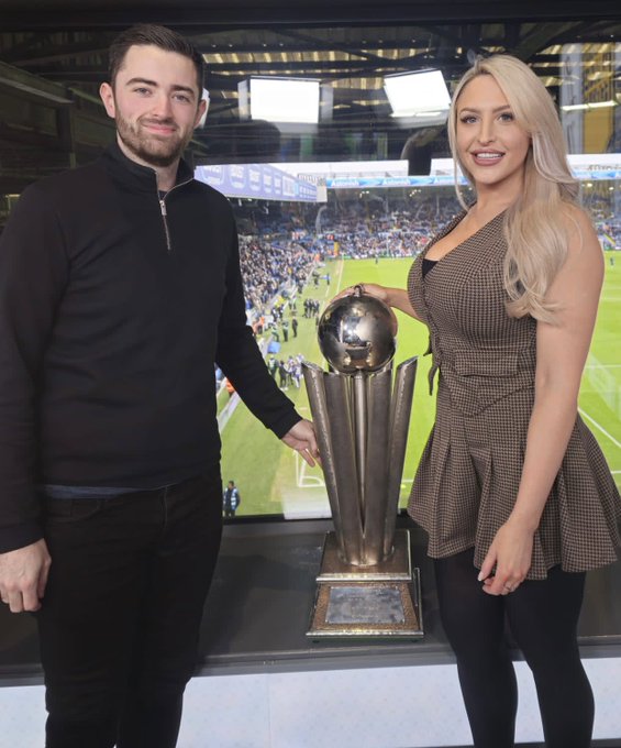 Emma Louise Jones poses with Luke Humphries & World Darts trophy but fans fear she’s ‘putting too much faith in buttons’