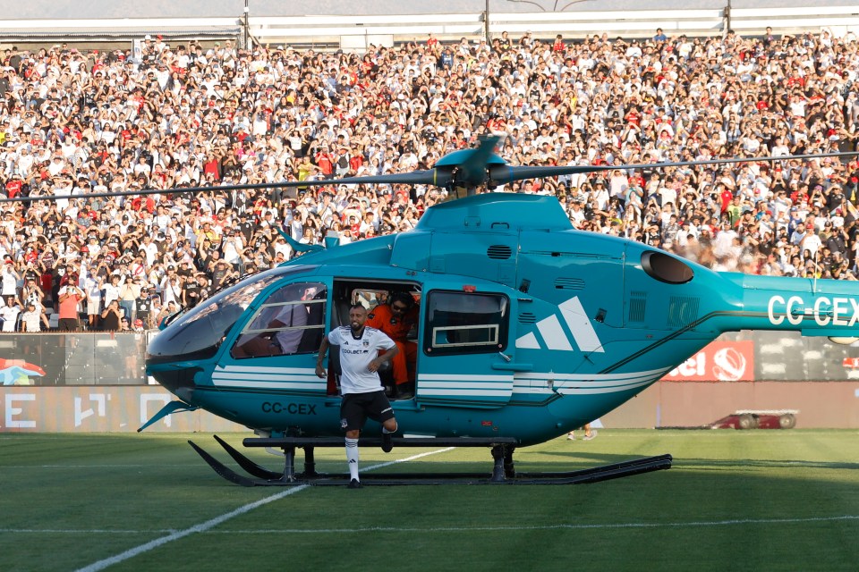 Arturo Vidal dresses as sword-wielding king on horse after arriving in HELICOPTER for unveiling in front of 35,000 fans