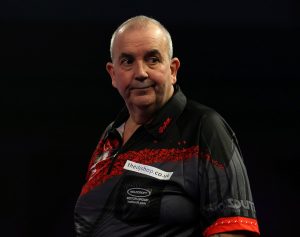 Darts legend Phil Taylor agrees to play Luke Littler, 17, in one-off match… on two conditions