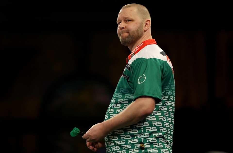 Who is darts player Radek Szaganski?