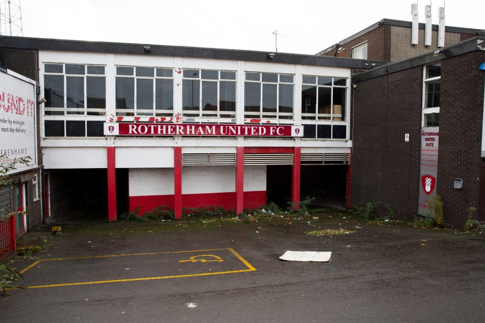 Inside abandoned English stadium covered in barbed wire with eerie new stand that has never hosted a match