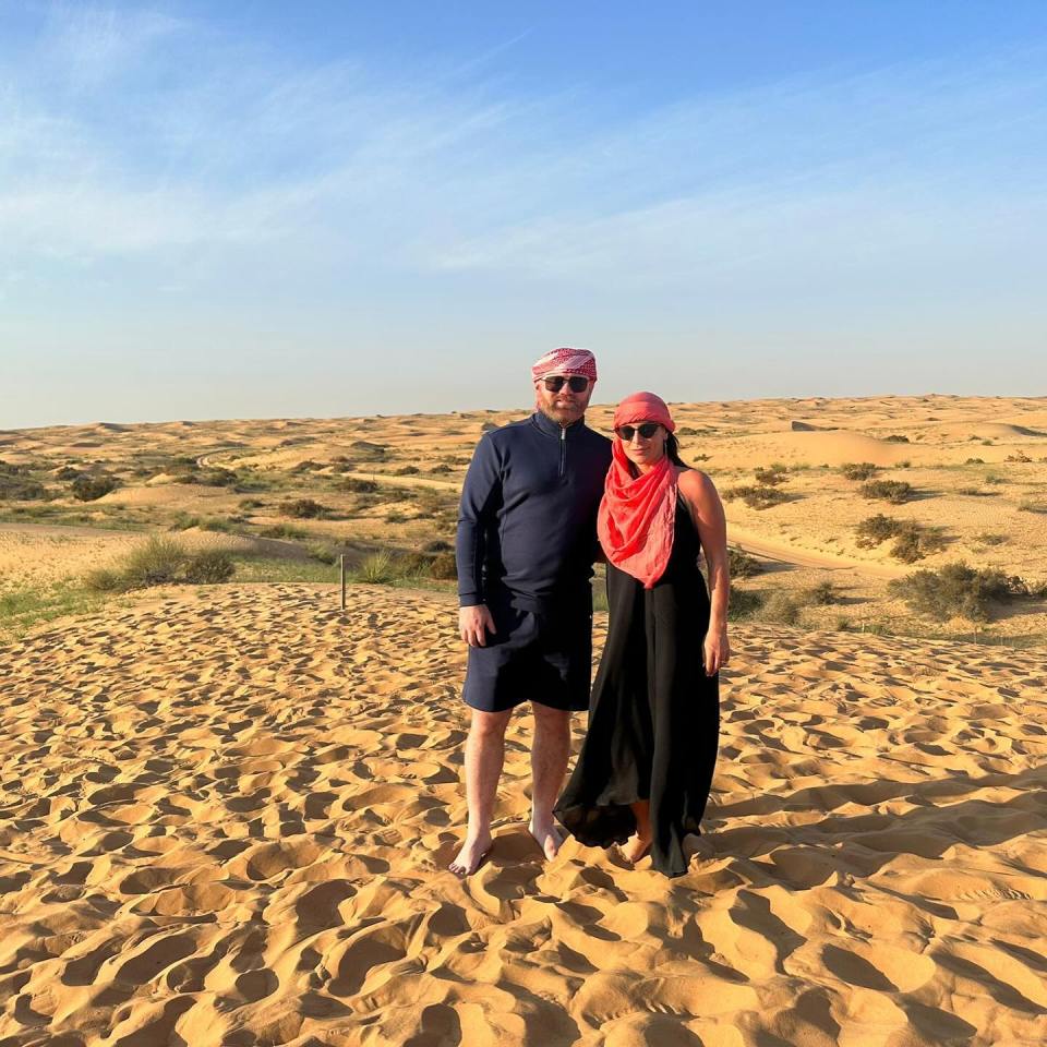 Wayne and Coleen Rooney seen wearing head scarfs as they ride camels in Dubai desert on luxury holiday