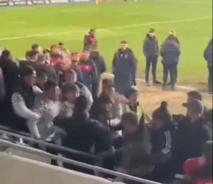 Rugby league coach in furious row with fan as bottle is thrown off supporter’s head and onlookers forced to step in