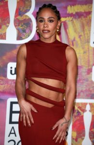 Alex Scott shows off toned abs as she joins partner Jess Glynne on red carpet at Brit awards as fans say she’s ‘slaying’