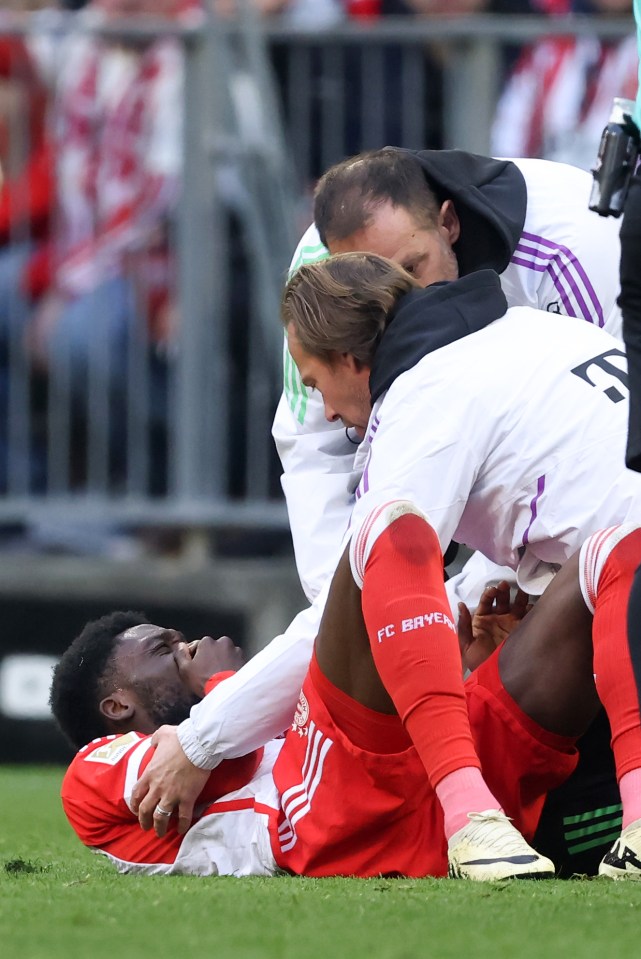 Alphonso Davies’ front teeth knocked out of place after horror challenge as Bayern Munich star is forced off