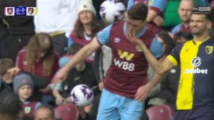 Fans baffled by ‘stupidest yellow ever seen as Burnley star is booked for ‘timewasting’ after just 25 SECONDS