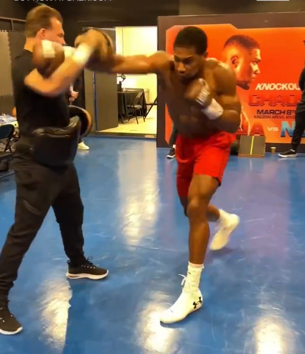 Amazing dressing-room footage shows Anthony Joshua practising exact punch that KO’d Francis Ngannou moments before fight