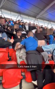 Shocking moment huge brawl breaks out in the stands at Wembley between fans supporting same team