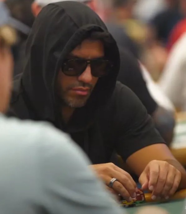 Premier League icon beats big-earning poker pro to £42,000 pot as he keeps low profile at table in hoodie and sunglasses