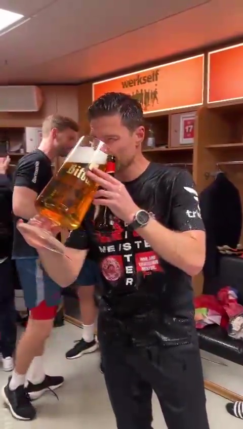 Inside Bayer Leverkusen’s wild dressing room party with Xabi Alonso drenched in beer THREE TIMES as Bayern reign ends