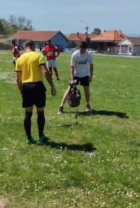 Footy clash descends into chaos as referee is bitten by SNAKE after bizarre backpack plan goes horribly wrong