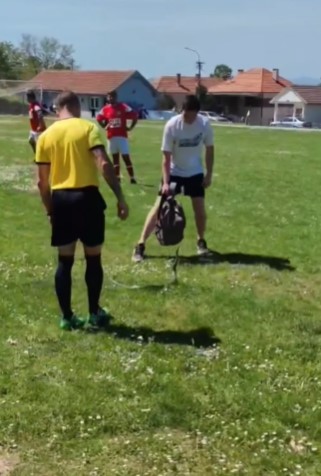 Footy clash descends into chaos as referee is bitten by SNAKE after bizarre backpack plan goes horribly wrong