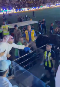 Shocking moment fan WHIPS rival striker after throwing water over him at Saudi Super Cup