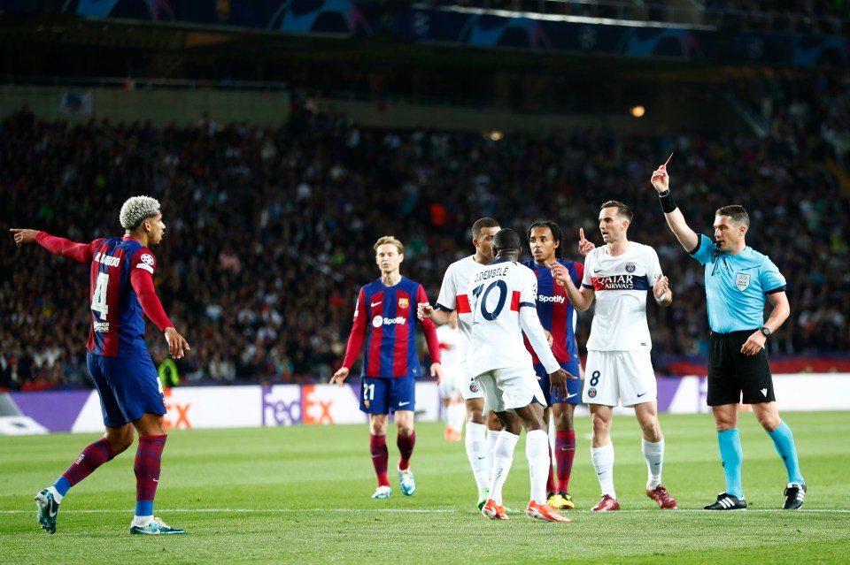 Furious fans say Barcelona ‘robbed’ by controversial red card in PSG clash as Ronald Araujo sent off