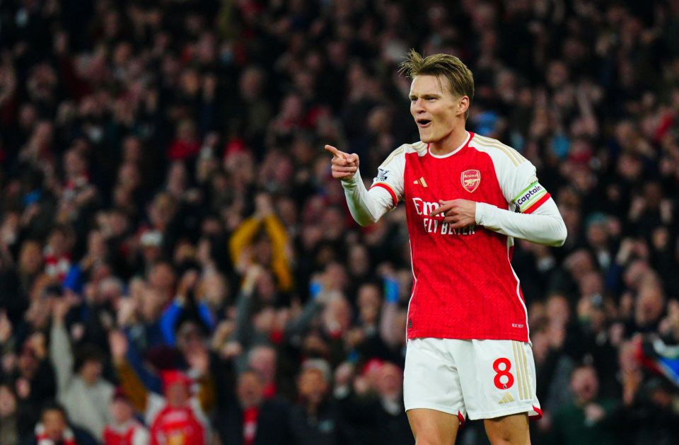 Arsenal 2 Luton 0: Much-changed Gunners go top of the Premier League as Odegaard helps his side ease past Hatters