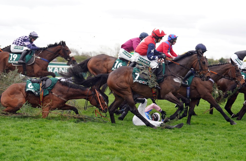 Jockey treated on track after horrible mid-race fall thankfully walks away OK at Aintree Grand National Festival