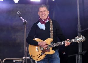 Former Premier League manager looks unrecognisable as he plays GUITAR outside old club’s stadium