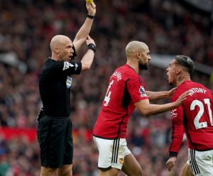 Antony held back from referee by Man Utd team-mate after ‘going CRAZY’ during Liverpool clash