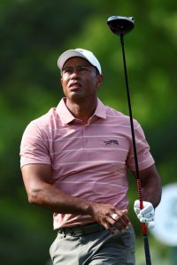 Watch Tiger Woods chip LEFT-HANDED to escape trees in brilliant Masters play as fans gasp ‘that is CRAZY’