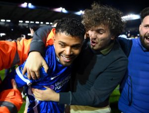 Thousands of fans flood onto Fratton Park pitch as Portsmouth return to Championship after 12 seasons away