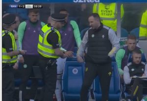 Moment ‘objects thrown towards Celtic dugout’ during Old Firm clash against Rangers as police spotted getting involved