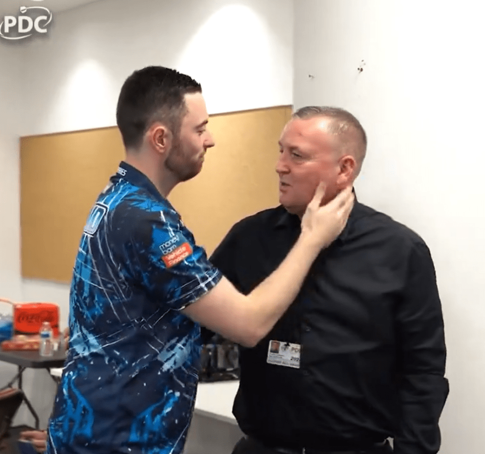 Classy Luke Humphries reduces fans to tears as he embraces darts legend Glen Durrant after tragic loss of his dad