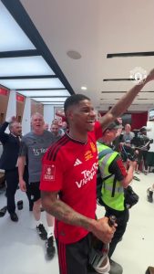 Man Utd fans gush ‘lovely to see Rashford smiling’ as club releases new footage from dressing room after FA Cup win