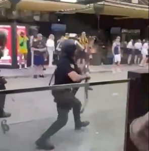 Moment Majorca riot cops fire rubber bullets at German football ‘ultras’ sending tourists fleeing in Brit hols hotspot