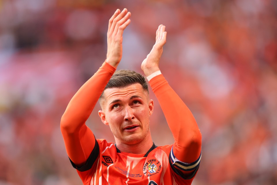 Luton release 14 PLAYERS including long-serving star in ruthless squad cull after relegation from Premier League