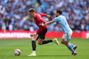 Moment Scott McTominay appears to struggle with leg injury on holiday by pool with ex-Man Utd team-mate Michael Carrick