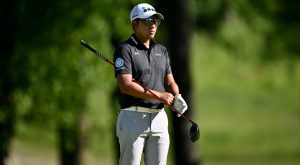 Watch incredible moment PGA Tour star picks random FAN from crowd to carry bag after regular caddie is injured in fall