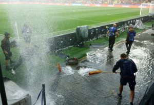 Euro 2024 fans in stitches and praise stadium worker for bizarre ways he tries to solve flooding problem