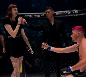 Watch brutal moment MMA fighter is rejected by girlfriend after proposing in ring immediately after defeat