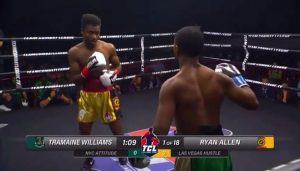 Boxer collapses mid-fight with apparent seizure as referee immediately waves off bout