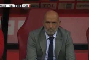 Watch bizarre moment Poland manager DISAPPEARS into thin air in dugout in ‘next level’ optical illusion