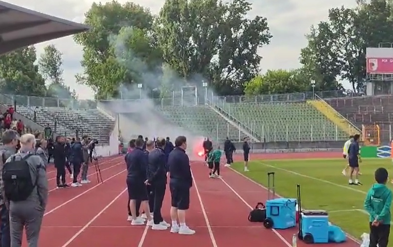 Flare-chucking Serb ultras try to storm their OWN training as 8,000 fans swarm stadium amid threat of England violence