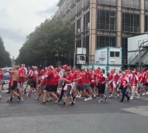 Watch Denmark fans taunt England supporters with cheeky chant as they march together ahead of Euro 2024 clash