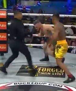 Watch as bare-knuckle boxer is dazed so badly from brutal punch that he starts fighting the REF in wild scenes