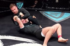 MMA fighter horrifically has elbow completely snapped in half after he is put to sleep while referee watches on