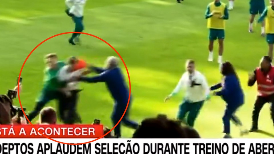 Premier League star takes out fan in shocking scenes at Portugal’s training session as fans storm pitch