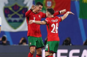 Cristiano Ronaldo celebrates with Portugal match-winner Conceicao… 21 years after replacing his dad