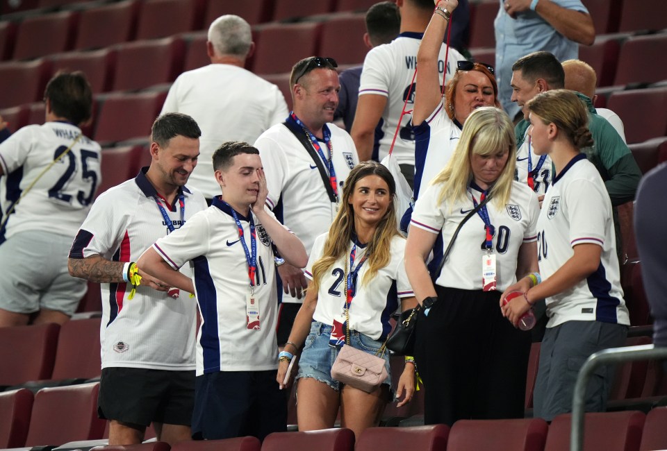 England Wags drenched in beer after cups hurled from crowd towards Gareth Southgate following bore draw with Slovenia